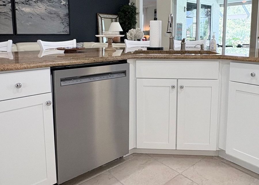 Refinished white kitchen cabinets