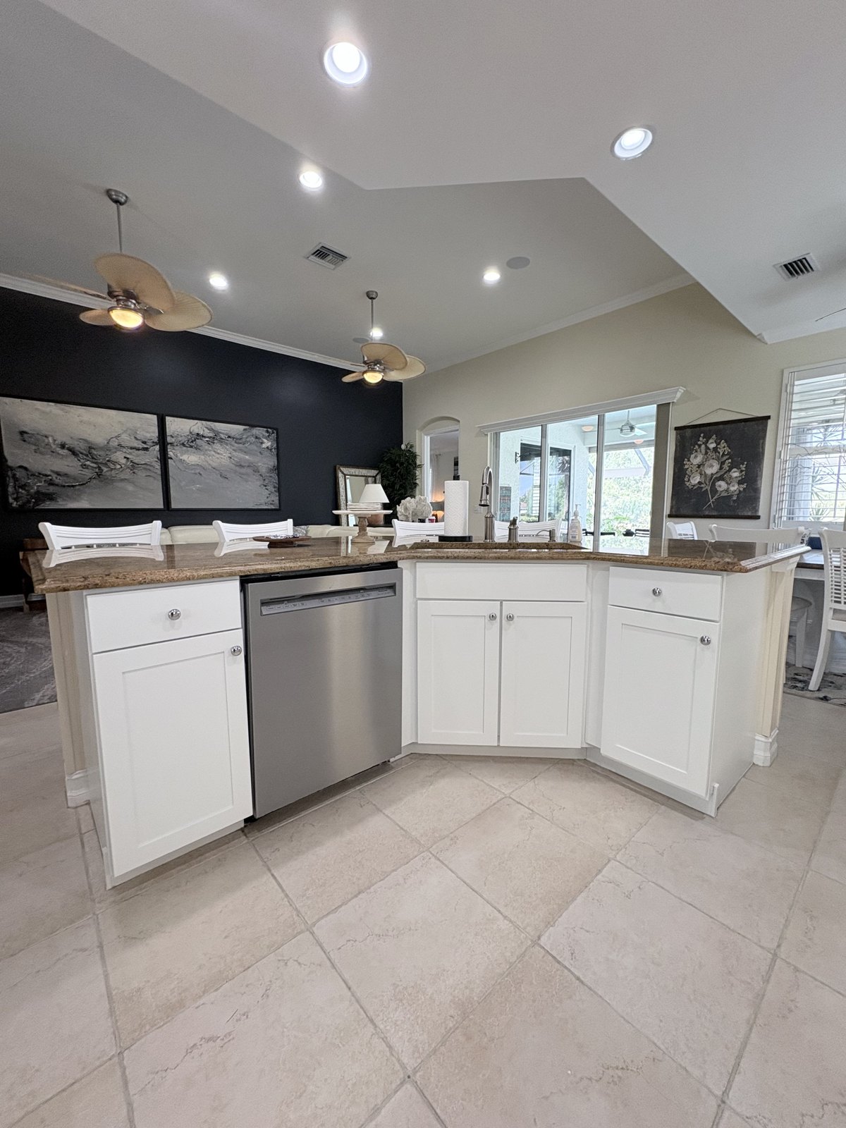 Bright white kitchen with freshly painted cabinets and island