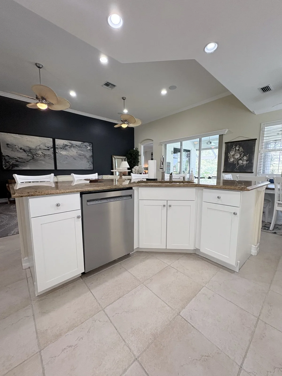 Bright white kitchen with freshly painted cabinets and island
