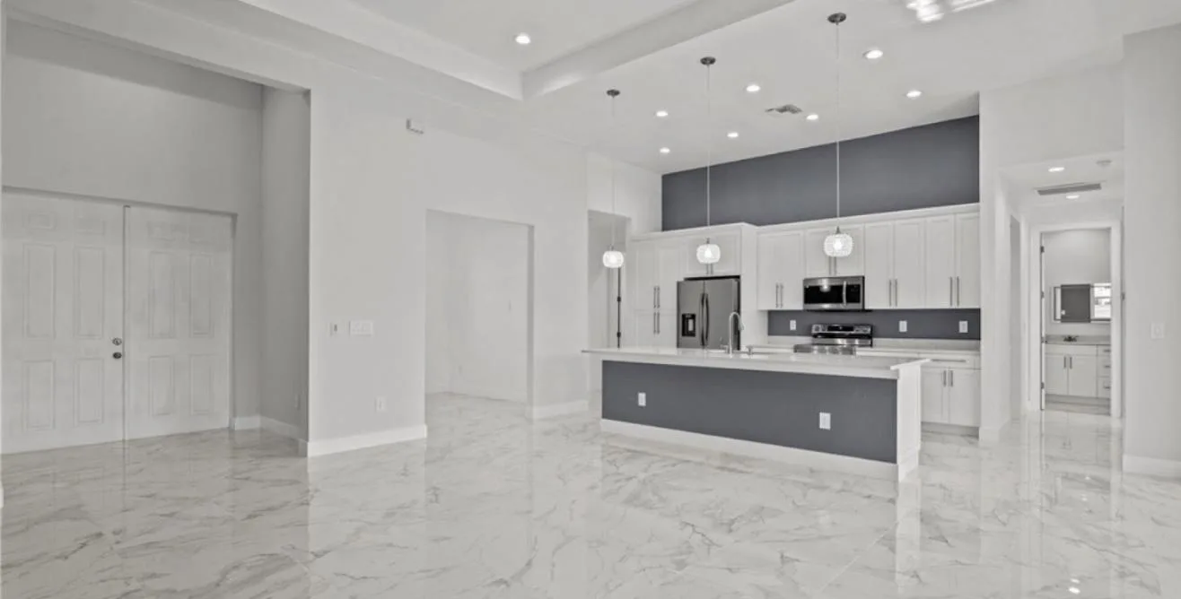 Great room with polished marble-look tile flooring